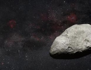 Massive asteroid passes between Earth and Moon