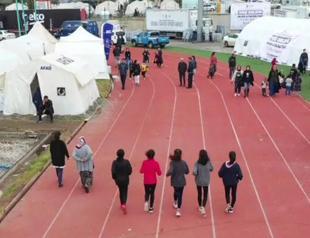 Medal-holder young athletes train in tent city