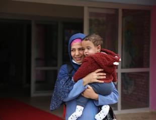 Baby handed over to family 50 days after quakes