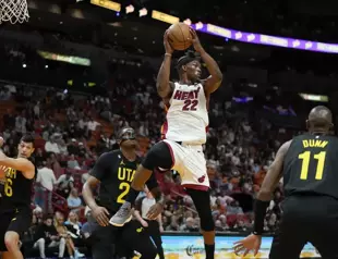 Butler inspires Heat victory over Mavs