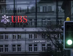 Up to 30 pct of jobs may go in UBS-Credit Suisse merger: Reports