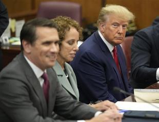 Trump, stone-faced, pleads not guilty in historic court appearance