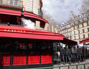 Protesters start fire at one of Macrons favorite restaurants