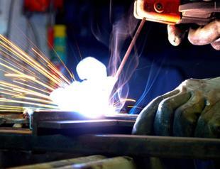 Industrial production contracts decline in February