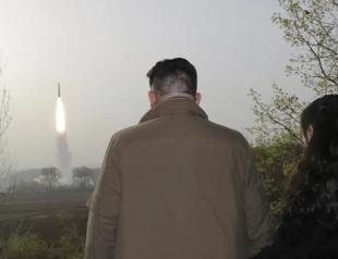 N Korea says it tested new solid-fuel long-range missile