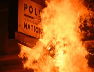 Macron signs France pension law despite protests