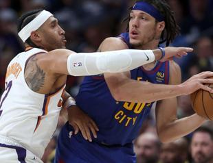 Nuggets thrash Suns in conference semifinal opener