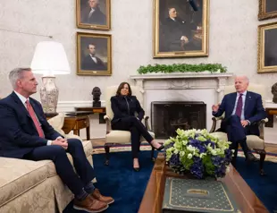 US debt row overshadows Bidens truncated Asia trip