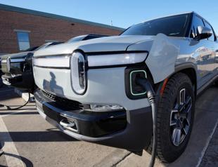Rivian to join Tesla charging network