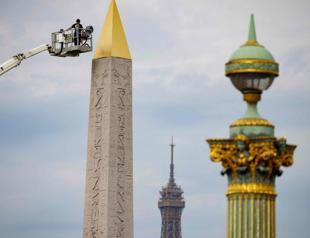Golden tip fixed atop Paris obelisk