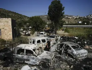Israeli settlers storm into Palestinian town in West Bank as Israeli airstrike escalates crackdown