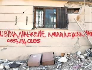 Demolition of hundreds of quake-hit buildings halted