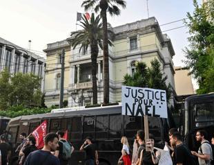 Crowds across France show solidarity at town halls targeted in rioting