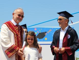 Former rector graduates from same university