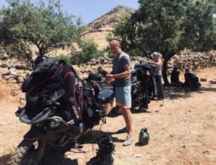 German couple on world tour pass by eastern city