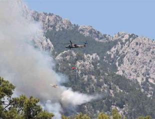 Firefighters struggle as wildfires rage in Kemer