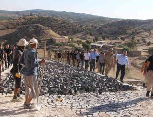 Families start to return after village cleared of terror