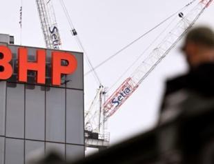 Profits, revenues sink at mining giant BHP