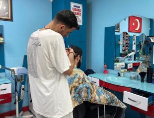 Local barbers revolt in southern city over foreign competition