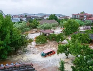 Torrential rains kill two in Greece after wildfires