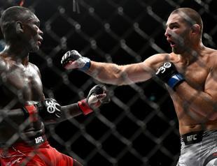 Strickland stuns Adesanya to win UFC title