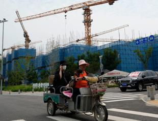 OECD sees sub-par global growth as high rates bite