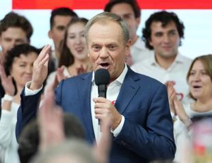 Polish opposition leader Tusk declares win after exit poll shows ruling conservatives lose majority