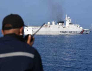 Philippines, China trade blame over collisions in disputed sea