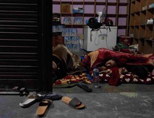 Thousands sleep outside in Nepal after earthquake kills at least 157 people, destroys most houses