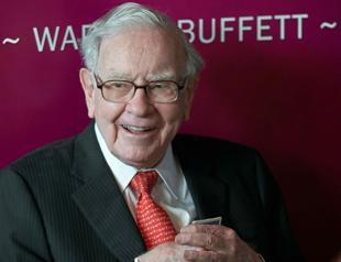 Buffetts firm reports $12.8 billion loss