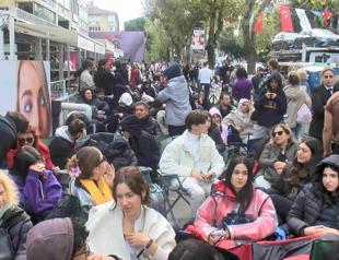 Hundreds queue for opening of famous cosmetics store