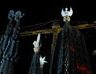 Barcelonas Sagrada Familia lights up new towers