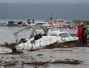 Torrential rain wreaks havoc on western, southern cities