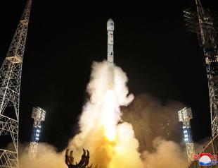 North Korea says spy satellite launch successful