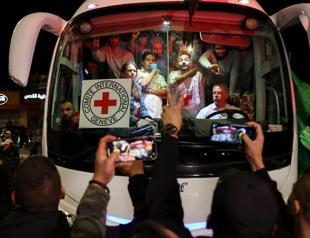 Israel and Hamas complete 2nd day of swaps after tense delay, as Gaza cease-fire holds