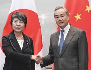 Top diplomats from Japan and China meet in South Korea ahead of 3-way regional talks