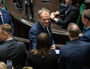 Polands pro-EU Tusk wins parliament backing to return as premier