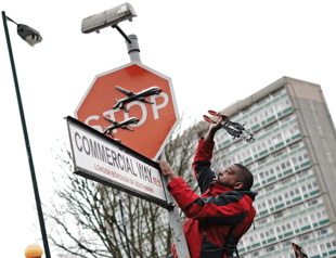 London police arrest men after Banksy installation removed