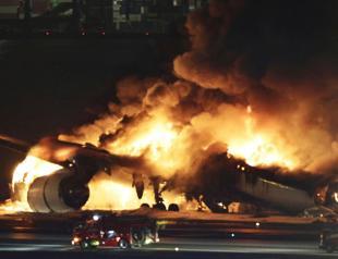 Planes collide in Tokyo, passengers and crew escape blazing fire