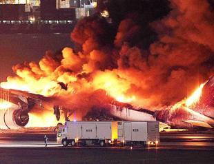 Japan Airlines says jet cleared to land before collision