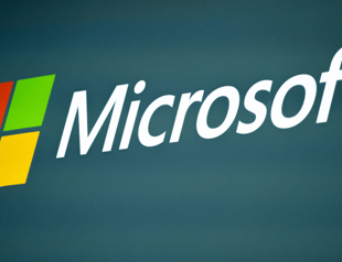 Microsoft adds AI button to keyboards to summon chatbots