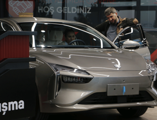 Auto sales reach record 1.23 million last year