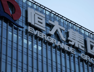 Evergrandes says head of EV arm detained