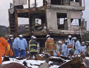 Japan sharply revises down quake missing