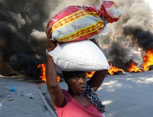 Gang fighting, demonstrations rock Haiti
