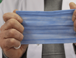 ‘Cocktail virus’ surge raises concerns for mask supply crunch