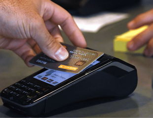 Card payments leap 122 percent last year