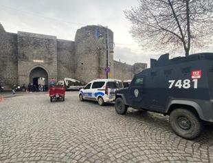 Two people taking selfies fall from city walls