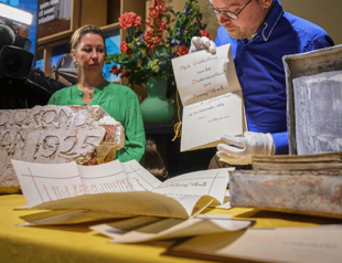 Dutch unveil century-old time capsule buried under kings statue