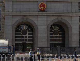 China says Australian writer given suspended death sentence